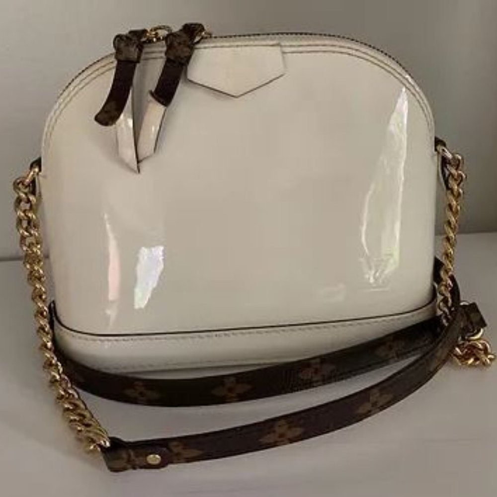 Authentic Louis Vuitton Alma Mini in Snow White